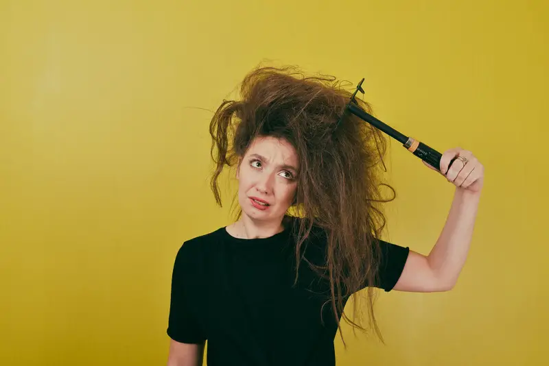 Woman with thick messy hair