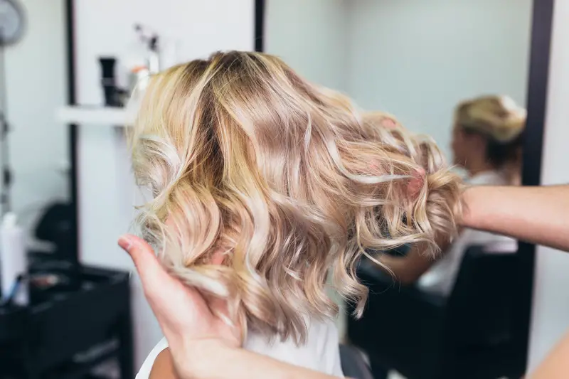 Curled blond hair with Hot Tools Professional