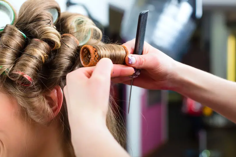 Curling hair with hot rollers